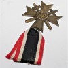 DISTINTIVO MERITI DI GUERRA CON SPADE IN BRONZO